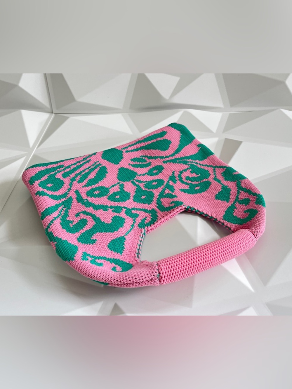 Pretty & Polished Pink and Green Knit Top Handle Clutch
Boho Style - Picture 3 of 11